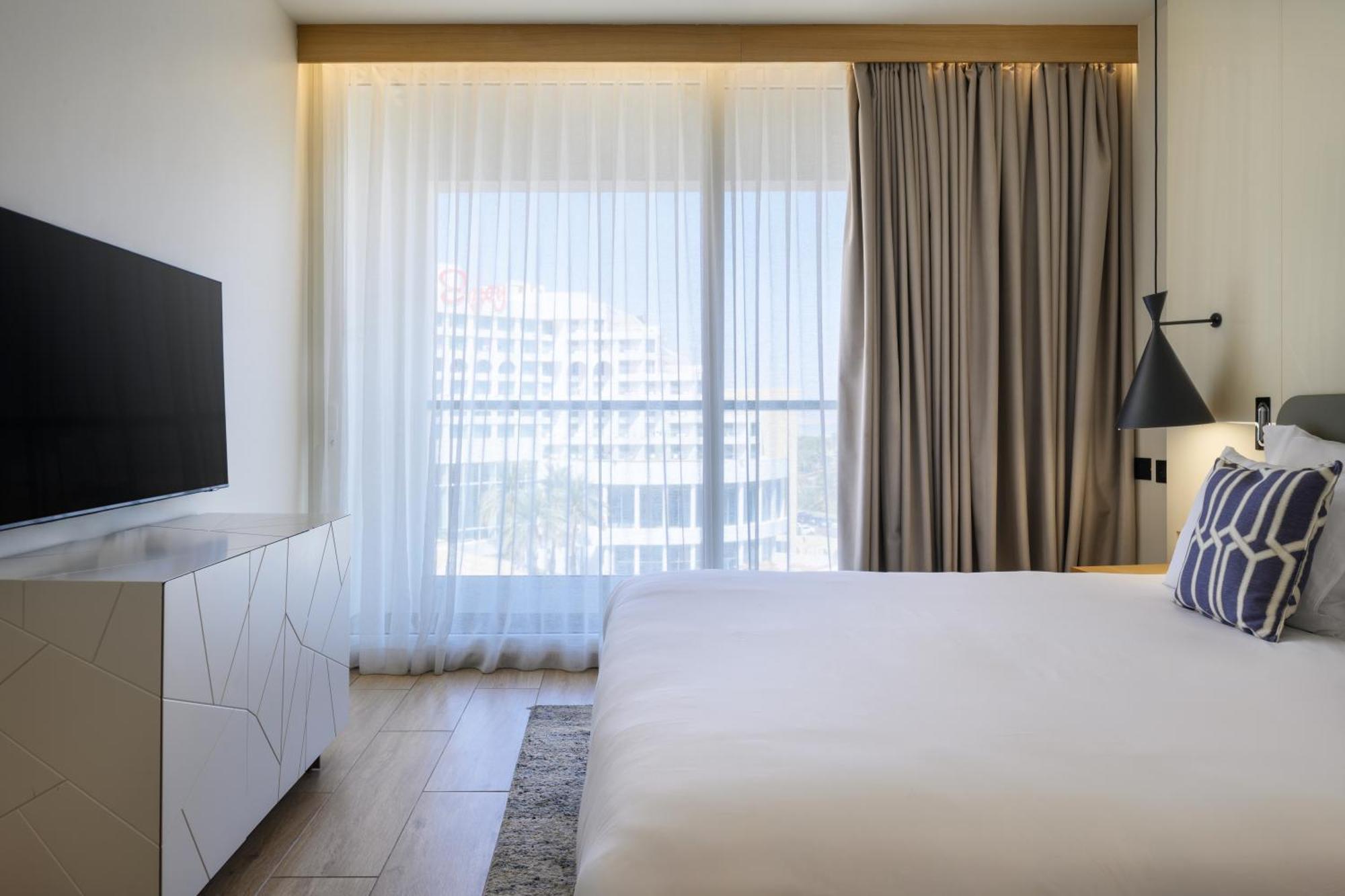 Nevo By Isrotel Collection Ein Bokek Luaran gambar A bedroom at the Hilton San Diego Bayfront